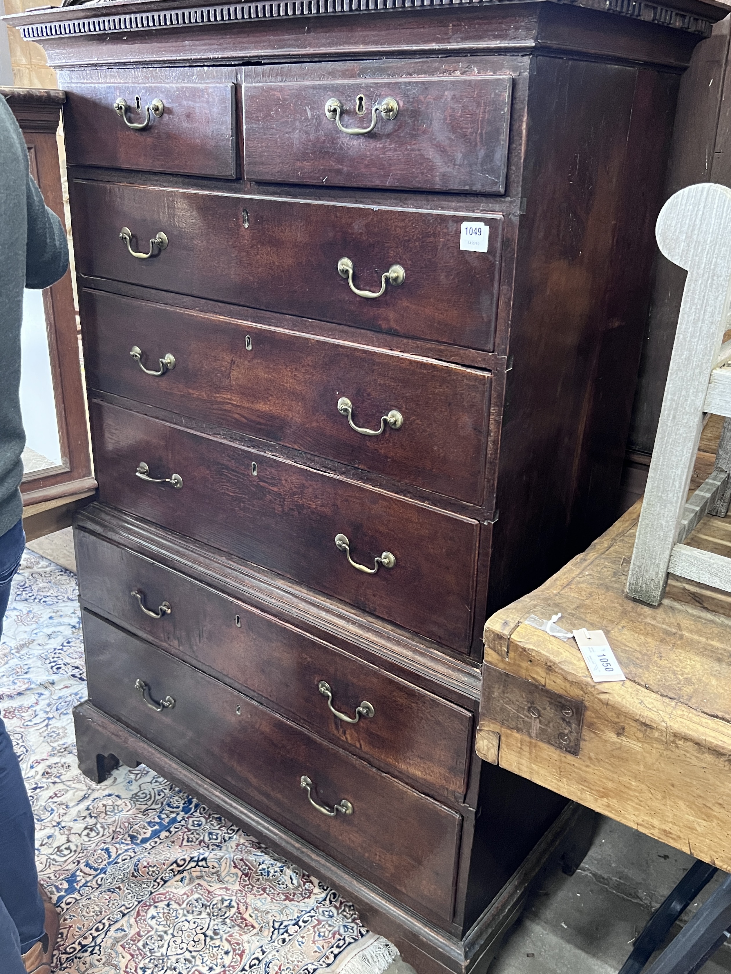 A George III oak chest on chest, width 109cm, depth 54cm, height 163cm